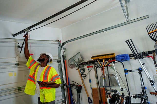 Professional Garage Door Spring Repair technician working in The Village, OK